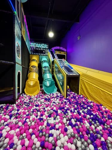 Slide tower with multiple slides